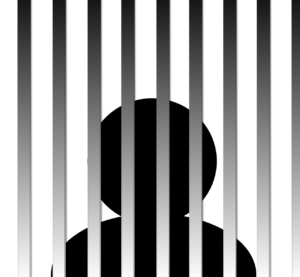 figure behind prison bars